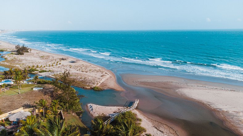 Vila pé na areia com vista incrível em Coqueiro